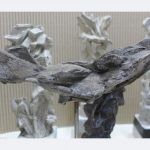 Andrea Tiebel-Quast, aus der Werkreihe "Spreewald_Ensemble" 2020 Skulptur, Beton, Holzuntergrund, Eiche und Buche Unikate